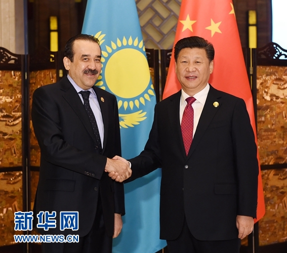 12月16日，国家主席习近平在浙江省乌镇会见哈萨克斯坦总理马西莫夫。新华社记者 饶爱民 摄