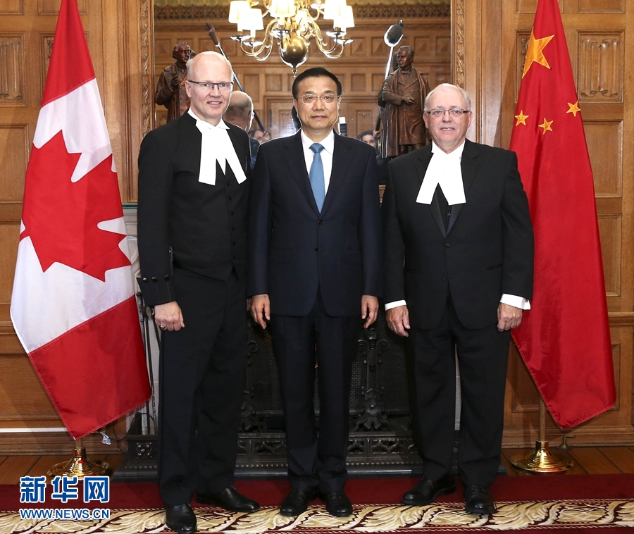 9月22日，国务院总理李克强在渥太华议会大厦会见加拿大参议长富里和众议长里甘。 新华社记者 庞兴雷 摄 