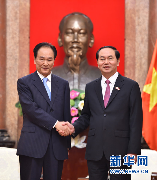 越南国家主席陈大光表示越中发展的成功互为彼