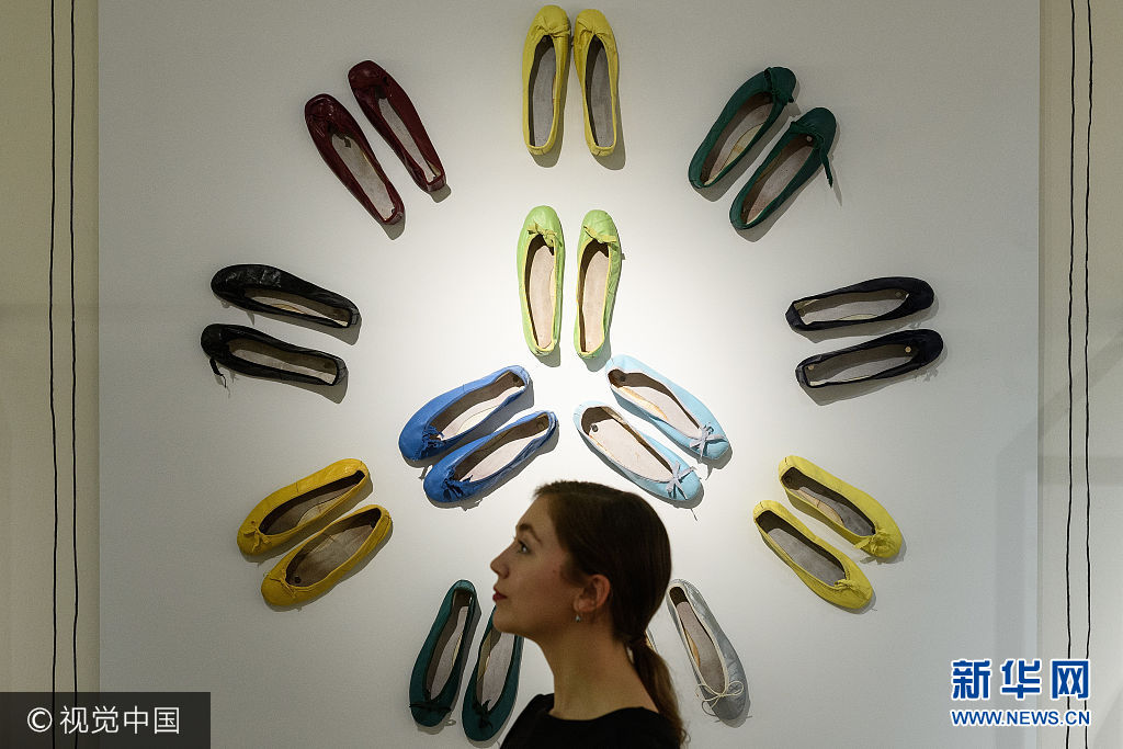 ***_***LONDON, ENGLAND - SEPTEMBER 22:  A gallery assistant poses in front of a selection of ballet shoes during a preview of items from the sale of actrees Audrey Hepburn's personal collection at Christies on September 22, 2017 in London, England.  The sale sees over 500 lots from the actresses career and personal life being sold at auction.  (Photo by Leon Neal/Getty Images)