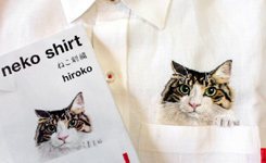日本主妇在衬衣口袋绣猫咪
